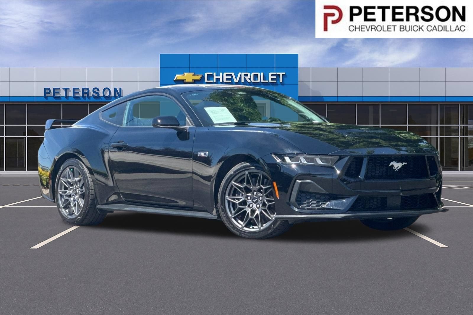 2024 Ford Mustang GT Fastback in Black — front three-quarter view