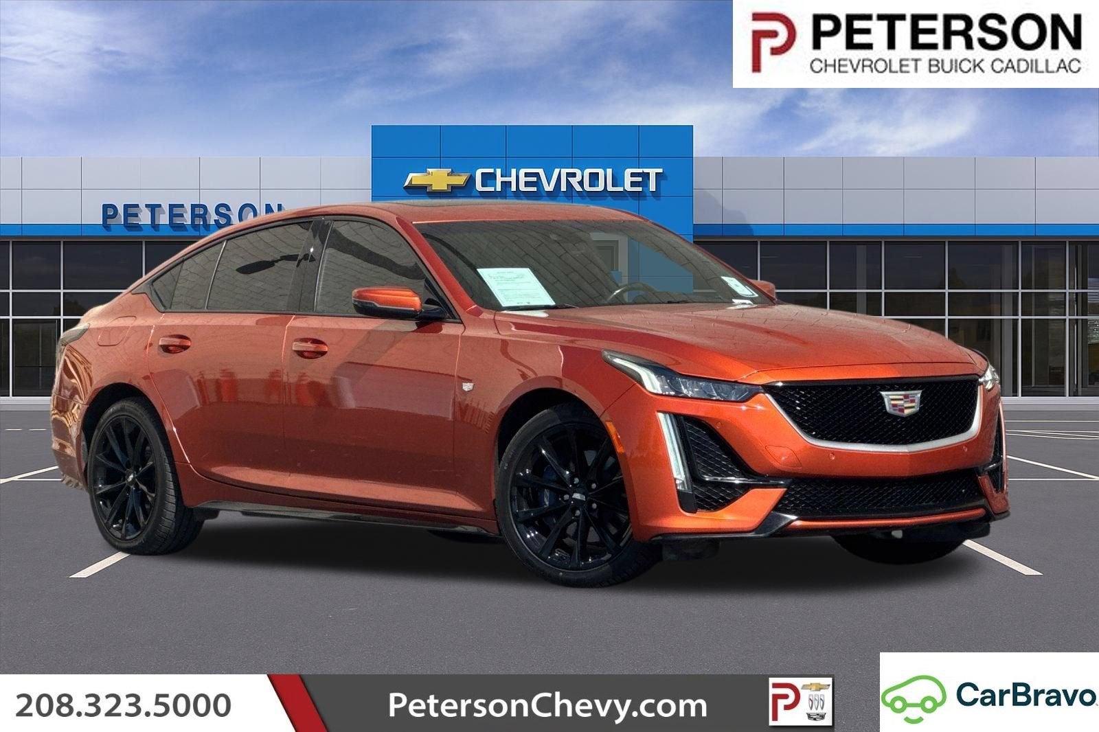 2023 Cadillac CT5 Sport in Blaze Orange Metallic — front three-quarter view