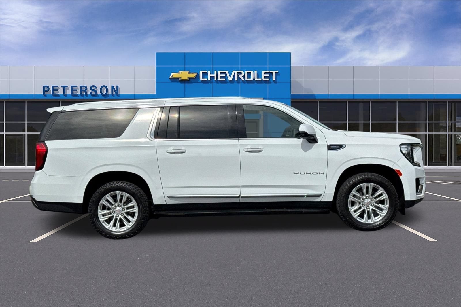 2024 GMC Yukon XL — rear three-quarter view