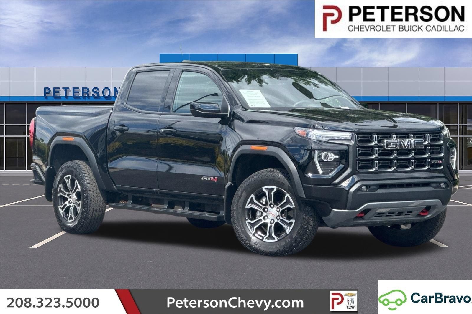 2025 GMC Canyon AT4 in Onyx Black — front three-quarter view