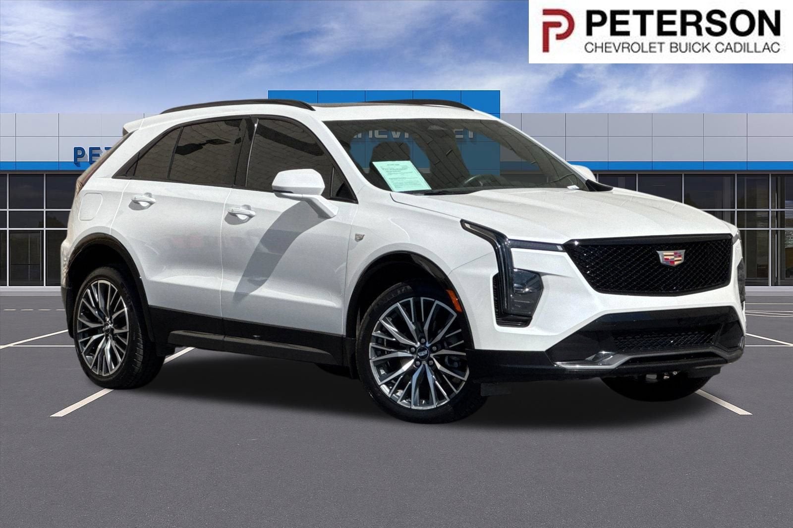 2024 Cadillac XT4 Sport in Crystal White Tricoat — front three-quarter view
