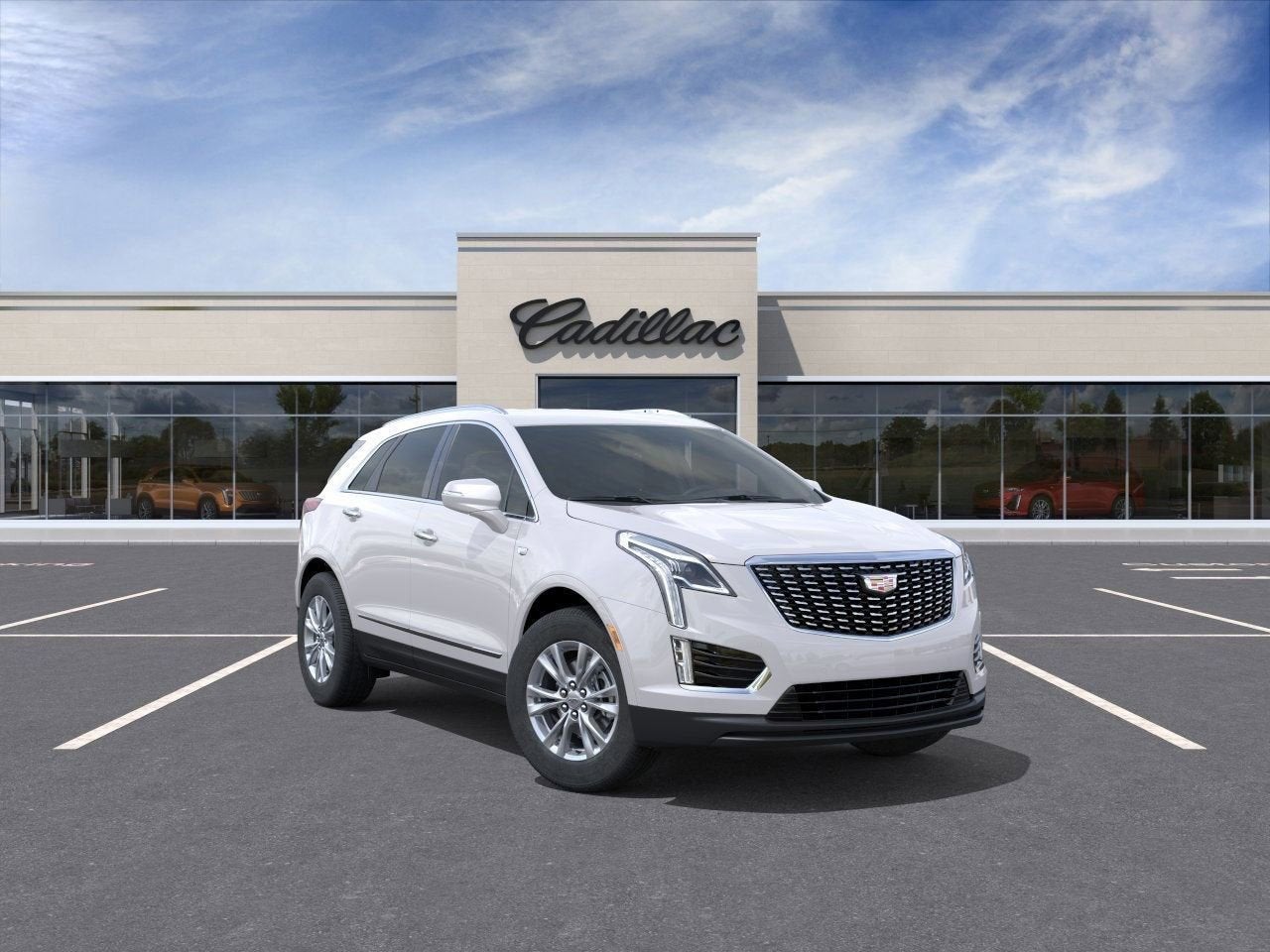 2025 Cadillac XT5 Luxury in Crystal White Tricoat — front three-quarter view