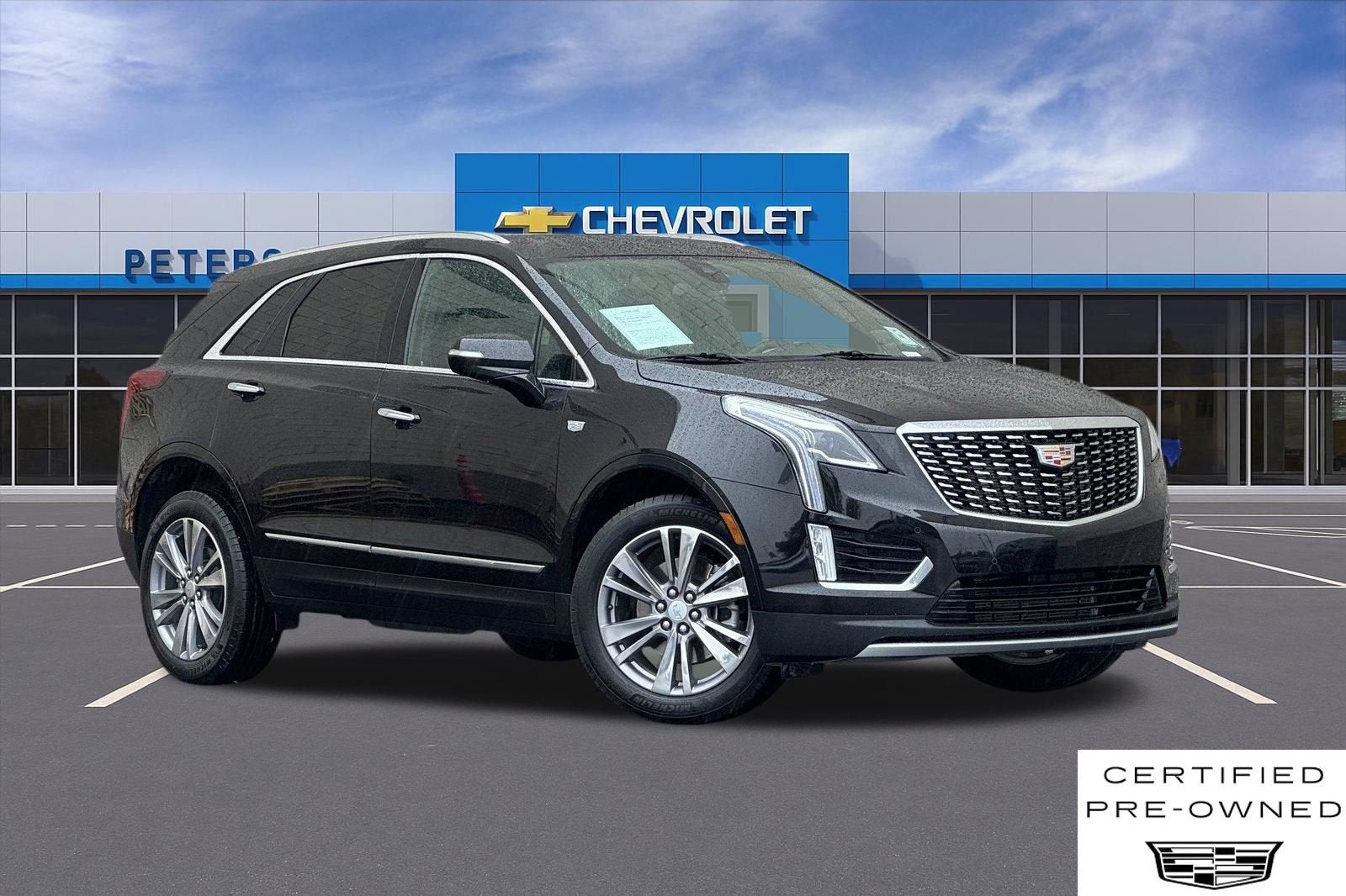 2025 Cadillac XT5 Premium Luxury in Stellar Black Metallic — front three-quarter view