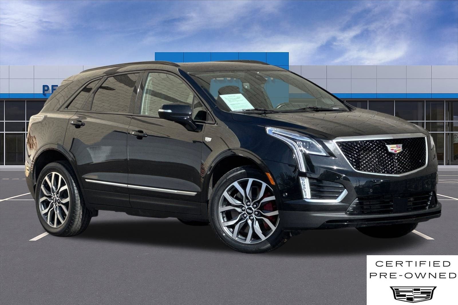 2023 Cadillac XT5 Sport in Stellar Black Metallic — front three-quarter view