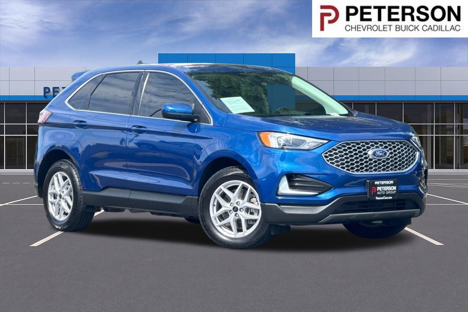 2024 Ford Edge SEL in Blue — front three-quarter view