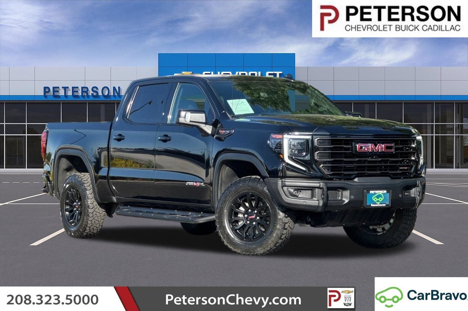2023 GMC Sierra 1500 AT4X in Onyx Black — front three-quarter view