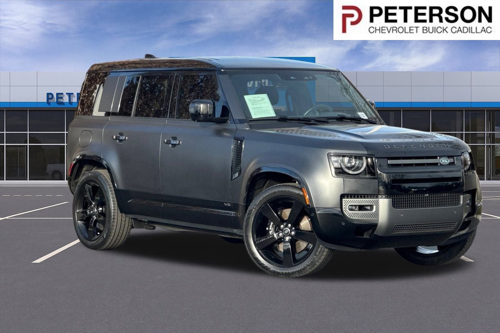 2025 Land Rover Defender 110 P525 V8 in Gray — front three-quarter view